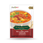 Kanokwan Red Curry Paste in a jar, traditional Thai grocery product with vibrant red color and fresh ingredients visible.