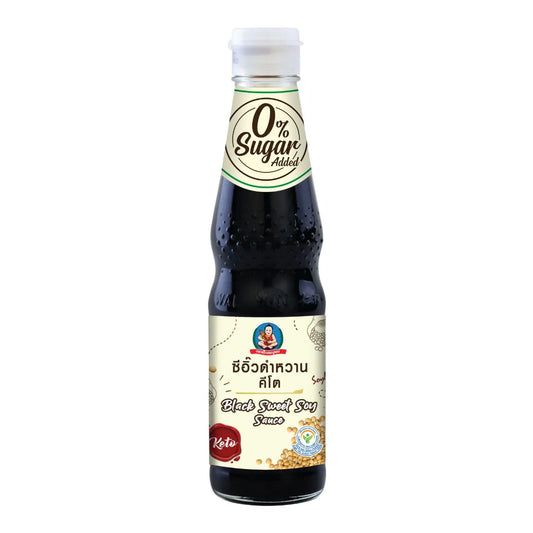 DEKSOMBOON Keto Black Sweet Soy Sauce 330g bottle, close-up showing dark soy sauce liquid in a clear glass container.