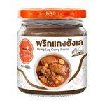 J-lek Hang Le Curry Paste 195g jar, dry grocery product with a label, ready for cooking flavorful Thai dishes