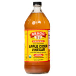 Bottle of Bragg Apple Cider Vinegar with a clear label, featuring a healthy lifestyle theme and natural ingredients.