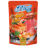 Fathai Hot Pot Instant Concentrated Creamy Tom Yum Soup in a jar, showcasing the soup's rich, creamy texture and vibrant Thai flavor.