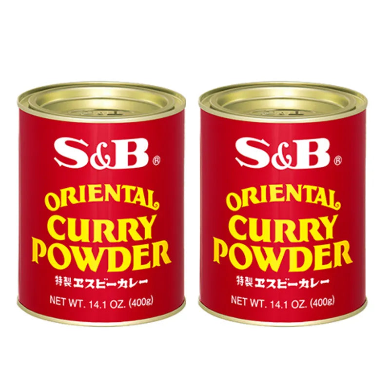 S & B Oriental Curry Powder Mix in two 400g cans with turmeric, coriander, orange peel, chili, cinnamon, and cardamom.