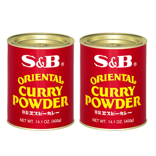 S & B Oriental Curry Powder Mix in two 400g cans with turmeric, coriander, orange peel, chili, cinnamon, and cardamom.