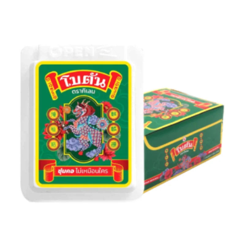 BOTAN Herbal Mouth Freshener White 24 pcs, showing white herbal tablets in a clear container with label and fresh mint leaves.