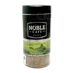 Noble Cafe Brazil instant coffee drink in a cup with a spoon, showcasing a rich, dark coffee beverage.