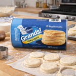 Pillsbury Grand Buttermilk Biscuit confectionery snacks with golden baked biscuits in a close-up image.