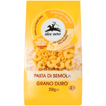 Organic Alce Nero macaroni pasta in a clear grocery bag, showing the golden, ridged pasta inside.