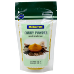 McGarrett Curry Powder jar showing vibrant yellow spice powder in a clear container, ideal for adding flavor to dishes.