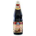 Healthy Boy Mushroom White Soy Sauce bottle for cooking, featuring a white label and dark soy sauce inside.