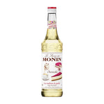 Monin Cheesecake Syrup 700ml bottle, dry grocery product with a clear label and distinctive packaging for desserts and beverages.