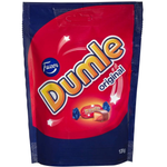 Fazer Dumle Original confectionery snacks showing a close-up of caramel and chocolate candies in a colorful package.