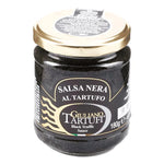 Jar of Giuliano Tartufi Black Truffle Sauce 180g in a glass container with a label, ideal for gourmet cooking and flavor enhancement.
