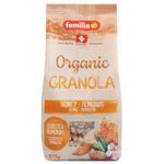 Familia Bio organic honey almond jar showing golden honey with almond pieces, packaging with natural and organic labeling.