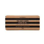 OLSSON Olsson SEL Seasalt 1kg in a clear plastic bag, showing coarse sea salt grains, for culinary use.