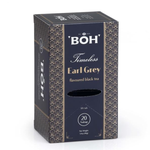 Boh Earl Grey tea drink in a clear glass bottle showing a dark tea liquid with a label on the front.
