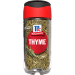 Fresh McCormick thyme leaves in a clear glass jar, showcasing green aromatic herb for cooking and seasoning.