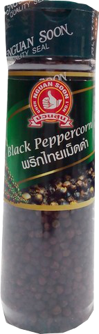 Nguan Soon black pepper corn in a clear glass jar, fresh whole peppercorns for cooking and seasoning.