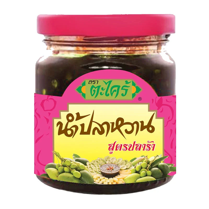 Takrai Fruit Dipping Pla Ra 200g jar with traditional fermented fish sauce for dipping and flavoring fruits and dishes.