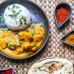 Vegan Ready Chick'N Tikka Masala in a bowl, showcasing plant-based chick'n pieces in rich, spicy tikka sauce on a white background.