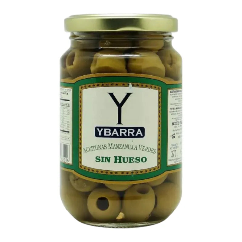 YBARRA Pitted Manzanilla Olives 350g jar, green Spanish olives with pits, in a clear glass container on a neutral background.