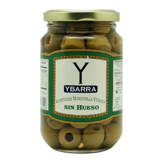 YBARRA Pitted Manzanilla Olives 350g jar, green Spanish olives with pits, in a clear glass container on a neutral background.