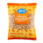 Aro Cashew Nuts 2kg package in dry grocery section, showing a clear view of the whole, raw cashew nuts in a sealed bag.