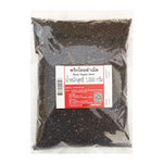 Makro black pepper seeds in a 1kg bag, dry grocery product, showing the small, dried black peppercorns ready for culinary use.