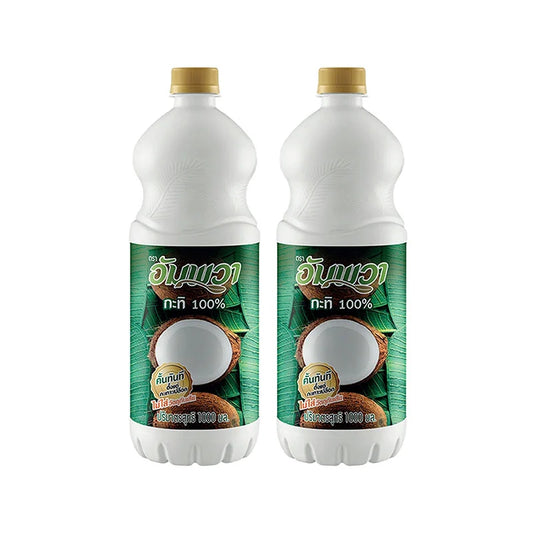 Two 1-liter PET bottles of AMPAWA Coconut Milk, creamy and fresh, with clear labeling on the packaging.