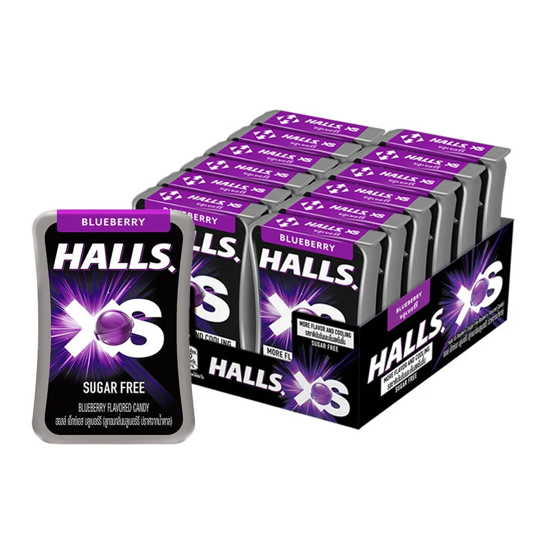 HALLS XS Blueberry lozenges in a clear plastic package, showing blueberry flavored hard candies inside.