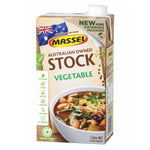 Massel Organic Liquid Vegetable Stock bottle showing clear liquid and label, used for cooking and enhancing flavor in recipes.