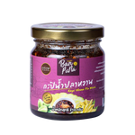 Ban Puna Kapi Naam Pla Waan in a bowl, showcasing traditional Thai grocery product with a dark, rich appearance.