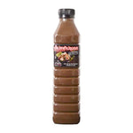 Tummour Fermented 500ml bottle in dry grocery aisle, showing the label and product packaging.