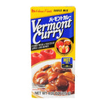 House Vermont Curry Hot 115g dry grocery package with vibrant curry sauce blend and branding visible in the image.