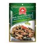 Nguan Soon Holy Basil Fried Rice in a bowl, garnished with fresh basil leaves, showcasing a flavorful Thai-inspired grocery dish.