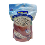 Dry black-eyed peas in a 500g package from Mcgarrett, displayed in a clear bag with visible beans inside.