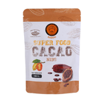 Baboo Raw Cacao Nibs in a clear bowl, showcasing small, crunchy dark cacao pieces for healthy confectionery snacking.