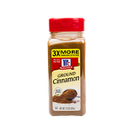 Ground cinnamon spice in a jar from McCormick, showing the spice's rich brown color and label on the container.
