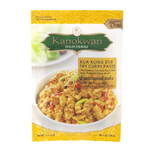 Kanokwan Kua Kling stir fry curry paste in a jar, showcasing the Thai spice blend with red chili and aromatic herbs.