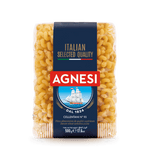 Agnesi Cellentani 93 pasta in a clear bowl, showing short, twisted pasta with ridged surface, from Agnesi grocery product line.