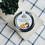Jar of Tartufi Morra Salt with Truffle from Tartufi Morra, showing the salt with black truffle pieces inside.