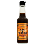 Bottle of Lea & Perrins Worcestershire Sauce on a grocery store shelf, showcasing the classic label and dark brown liquid inside.
