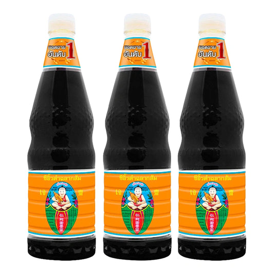 Three bottles of DEK SOM BOON Dark Soy Sauce Orange, 1.35L each, with dark brown soy sauce visible in transparent bottles.