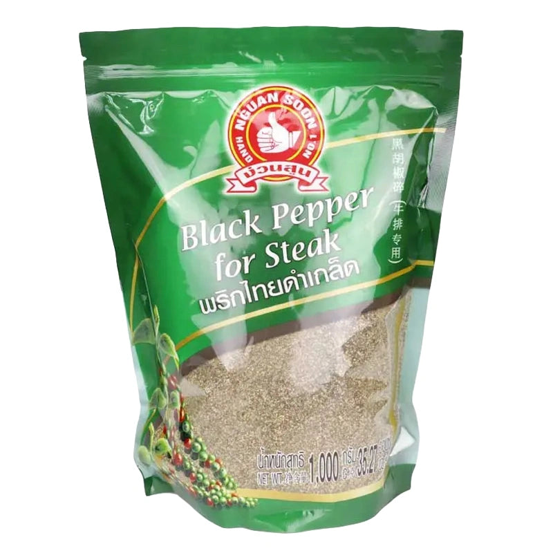 Black pepper flakes in a 1 kg package from No.1 Hand Brand, showing the textured, flaky pepper pieces.