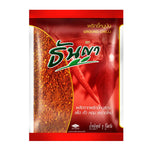 Dry ground chili from THANYA, 1kg packet, showcasing vibrant red chili flakes in a clear bag for cooking and seasoning.
