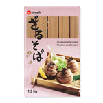 Dry Sempio buckwheat noodles in 1.3kg package, showing uncooked, thin, dark brown noodles ideal for Asian cuisine.