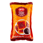 A jar of ARO Chilli Paste in Oil, 1kg, with red chili peppers and oil visible, used as a spicy condiment or cooking ingredient.