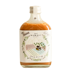 Bottle of Komori Sesame Salad Dressing showing the label and cap, ideal for healthy grocery and salad enhancement.
