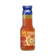 Bottle of Chua Hah Seng Chilli Sauce 330g with red chili peppers and label visible.