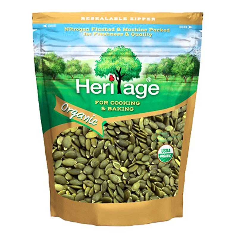 HERITAGE Organic Raw Pumpkin Seeds in a 454g bag showing fresh, raw pumpkin seeds on the packaging.