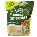 Whole oat groats in a clear glass jar, showing the light brown, whole grains of Verre grocery product on a white background.